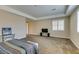 Bright and spacious carpeted main bedroom with neutral walls, and plantation shutters at 9731 Addie Meadow Ct, Las Vegas, NV 89149