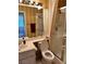 Bathroom featuring a neutral vanity, toilet, and a glass-enclosed shower for a clean, functional space at 976 Dancing Vines Ave, Las Vegas, NV 89183