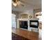 Stylish living room boasts hardwood floors, fireplace, and an open design for easy entertaining at 976 Dancing Vines Ave, Las Vegas, NV 89183