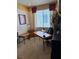 Inviting home office with a spacious desk, window, and neutral decor providing a serene workspace at 976 Dancing Vines Ave, Las Vegas, NV 89183