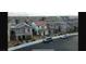 An aerial view showcasing a residential neighborhood with well-kept homes and convenient street parking at 1027 Brilliant Meadow Ave, North Las Vegas, NV 89086