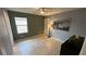 Well-lit bedroom featuring wood flooring and lots of natural light at 1027 Brilliant Meadow Ave, North Las Vegas, NV 89086