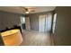 Open bedroom featuring neutral colored walls and new laminate flooring at 1027 Brilliant Meadow Ave, North Las Vegas, NV 89086