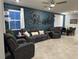Comfortable living room with contemporary decor and plenty of natural light at 1027 Brilliant Meadow Ave, North Las Vegas, NV 89086
