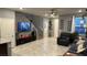 Cozy living room featuring modern entertainment setup and inviting seating at 1027 Brilliant Meadow Ave, North Las Vegas, NV 89086