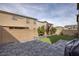 Private backyard featuring an artifical lawn at 10376 Sadie Blake Ave, Las Vegas, NV 89166