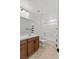 Well-lit bathroom with a single sink vanity and shower-tub combination at 10376 Sadie Blake Ave, Las Vegas, NV 89166