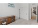 Cozy bedroom with closet, wood media center, and calm ocean-themed artwork at 10376 Sadie Blake Ave, Las Vegas, NV 89166