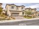 Charming two-story home with desert landscaping, paved driveway, and two car garage at 10376 Sadie Blake Ave, Las Vegas, NV 89166