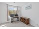 Bright home office with natural light, neutral carpet, and modern desk at 10376 Sadie Blake Ave, Las Vegas, NV 89166