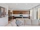 Modern kitchen featuring stainless steel appliances, a kitchen island, and ample cabinet space at 10376 Sadie Blake Ave, Las Vegas, NV 89166