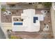 Aerial view of a home with solar panels, desert landscaping, and a private backyard at 10505 Linden Wood Ct, Las Vegas, NV 89134