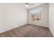 Bedroom features carpeted floors, ceiling fan, and bright windows at 10505 Linden Wood Ct, Las Vegas, NV 89134