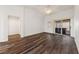 Bright bedroom features wood-look flooring, walk-in closet and sliding glass door at 10505 Linden Wood Ct, Las Vegas, NV 89134