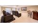 Finished basement with a home theater, bar area, and comfortable seating at 11072 Pentland Downs St, Las Vegas, NV 89141