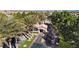 View of the community gate, lush landscaping, guard house, and secure entry at 11072 Pentland Downs St, Las Vegas, NV 89141