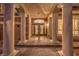 Grand entrance to this home featuring stone pillars and ornate double doors at 11072 Pentland Downs St, Las Vegas, NV 89141