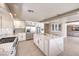 Well-appointed kitchen featuring a large island with seating and stainless steel appliances at 11072 Pentland Downs St, Las Vegas, NV 89141