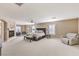 Spacious main bedroom with fireplace, sitting area, plush carpet and great natural light at 11072 Pentland Downs St, Las Vegas, NV 89141