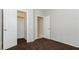 Bedroom features neutral carpet and walk-in closet at 11204 Newbury Hills Ave, Las Vegas, NV 89138