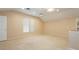 Open bonus room with neutral carpet, a ceiling fan, and plenty of natural light at 11204 Newbury Hills Ave, Las Vegas, NV 89138