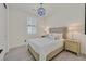 Bright bedroom with a comfortable bed and contemporary nightstands at 11705 Bearpaw Meadow Ave, Las Vegas, NV 89138