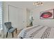 Stylish bedroom features a comfortable bed, modern lighting, and closet at 11705 Bearpaw Meadow Ave, Las Vegas, NV 89138