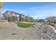 Landscaped community area with desert landscaping, offering a serene and inviting environment at 11705 Bearpaw Meadow Ave, Las Vegas, NV 89138