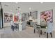 Modern kitchen featuring gray cabinetry, stainless steel appliances, and a stylish island with breakfast bar at 11705 Bearpaw Meadow Ave, Las Vegas, NV 89138