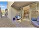 Cozy patio space with stylish egg chairs, perfect for enjoying the outdoors at 11705 Bearpaw Meadow Ave, Las Vegas, NV 89138