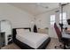 Bright bedroom with natural light, modern furnishings, and a sleek design at 12346 Valley Chase Ave, Las Vegas, NV 89138