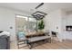 Modern dining area with sleek furniture and a view of the outdoor pool at 12346 Valley Chase Ave, Las Vegas, NV 89138