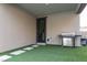 Covered patio with a built-in grill and convenient access to the house at 12346 Valley Chase Ave, Las Vegas, NV 89138