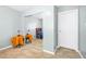 This bedroom features a mirrored closet and tiled floor at 1589 Silver Mesa Way, Las Vegas, NV 89169