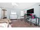 Spacious bedroom features ample desk space and modern lighting at 1589 Silver Mesa Way, Las Vegas, NV 89169