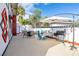 This backyard patio includes furniture, grill and privacy wall at 1589 Silver Mesa Way, Las Vegas, NV 89169