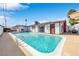 This home features a large private pool and patio area at 1589 Silver Mesa Way, Las Vegas, NV 89169