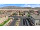 Gated neighborhood entry with beautifully maintained desert landscaping at 1606 Wild Grain Ave, North Las Vegas, NV 89086