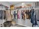 Walk-in closet has ample storage with shelving for clothes, shoes, and accessories at 1606 Wild Grain Ave, North Las Vegas, NV 89086