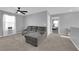 Upstairs living area offers a comfortable sectional sofa and good light at 1606 Wild Grain Ave, North Las Vegas, NV 89086