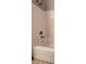 Bathroom featuring a tiled tub and shower combination at 1655 Morse Arberry Ave, Las Vegas, NV 89106