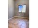 Bedroom featuring tile floors, natural light and neutral walls perfect for personalization at 1655 Morse Arberry Ave, Las Vegas, NV 89106