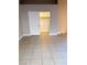 Bedroom with tile floors, sliding closet door and baseboards ready for personalization at 1655 Morse Arberry Ave, Las Vegas, NV 89106