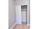 Bedroom closet featuring sliding doors, tile floors and rod for organizing clothes at 1655 Morse Arberry Ave, Las Vegas, NV 89106