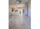 Bright and airy living room featuring tile flooring and natural light at 1655 Morse Arberry Ave, Las Vegas, NV 89106