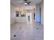Bright and airy living room featuring tile flooring and natural light at 1655 Morse Arberry Ave, Las Vegas, NV 89106
