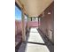 Covered patio has a concrete floor and views of the backyard at 1655 Morse Arberry Ave, Las Vegas, NV 89106