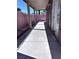 The long covered patio stretches along the back of this home at 1655 Morse Arberry Ave, Las Vegas, NV 89106