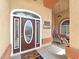 Inviting front entrance with decorative glass door and welcoming accents at 1830 E Fuchsia St, Pahrump, NV 89048
