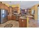 Spacious kitchen with stainless steel appliances, granite countertops, and ample cabinet space at 1830 E Fuchsia St, Pahrump, NV 89048
